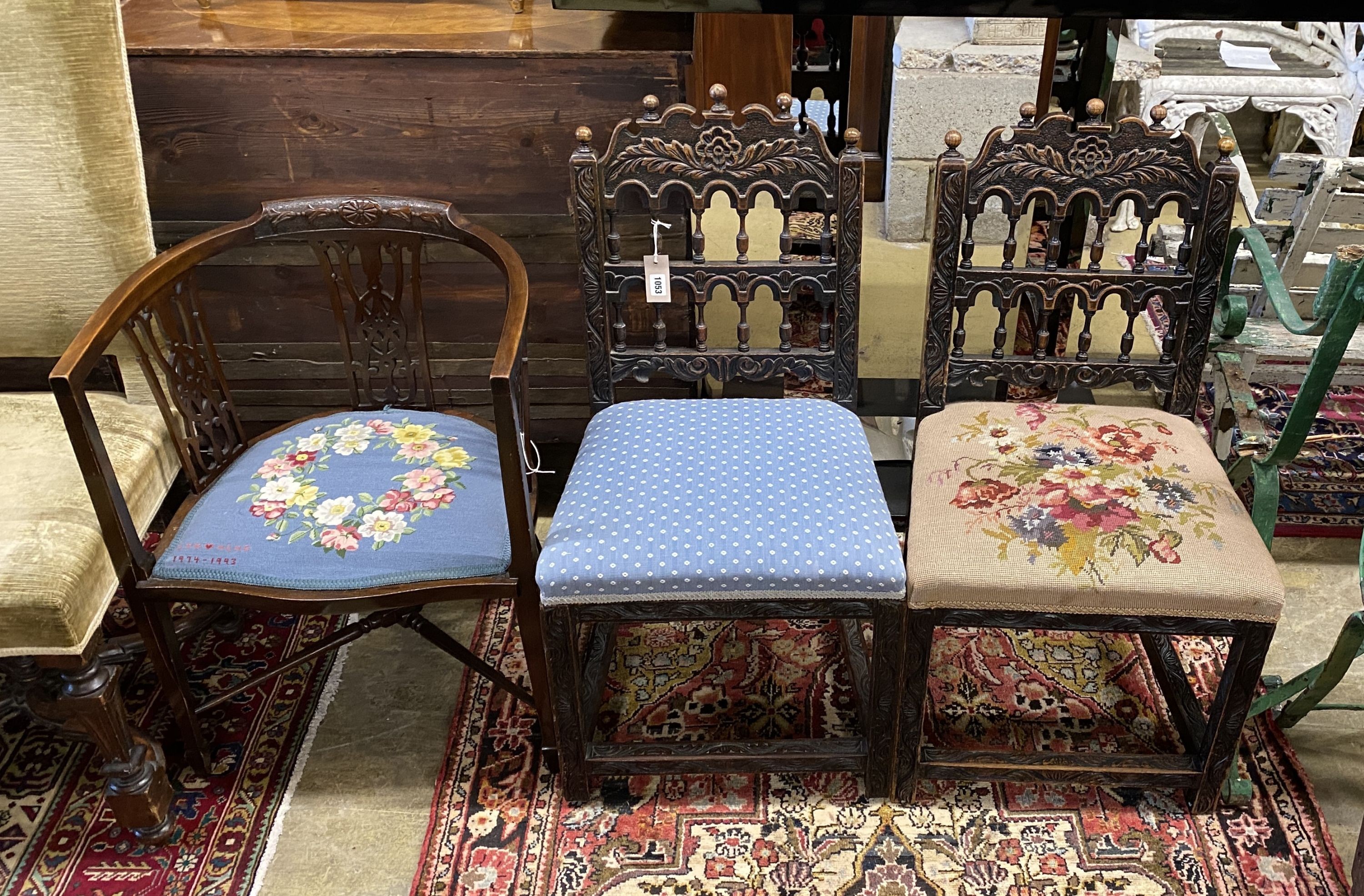 A pair of Scandinavian carved oak side chairs, embroidered seat, together with an Edwardian mahogany tub framed elbow chair